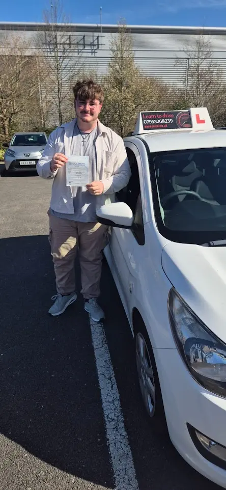 Successful driving test pass certificate held by student 13 who learned with Jo Learn To Drive driving school