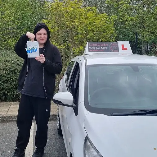 Successful driving test pass certificate held by student 9 who learned with Jo Learn To Drive driving school